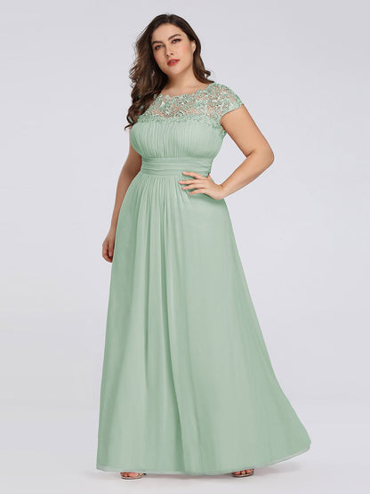 Elegant Lace Cap Sleeve Chiffon Evening Gown with Ruched Detail: Lacey Neckline Open Back Ruched Bust Plus Size Evening Dress