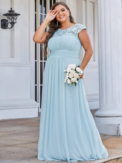 Elegant Lace Cap Sleeve Chiffon Evening Gown with Ruched Detail: Lacey Neckline Open Back Ruched Bust Plus Size Evening Dress