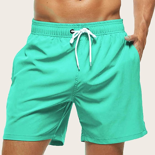 Winter-Ready Men's Black and Green Board Shorts with Mesh Lining