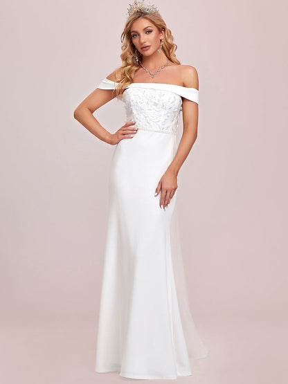 Elegant Off-Shoulder Fishtail Wedding Gown with Floral Appliques